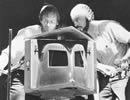 Tom Valentine and John Hatt adjust the ornithopter's collapsible landing gear.